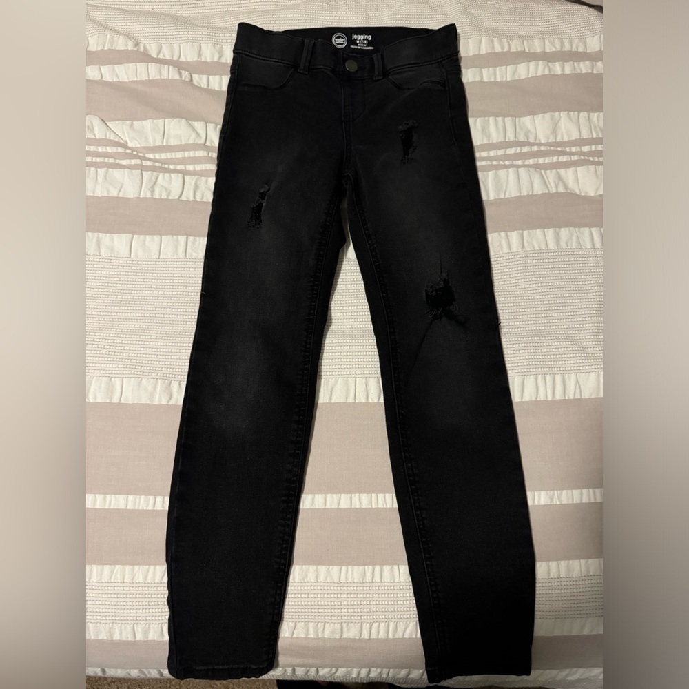 Girls black skinny jeans- size 7 ( with 3 distressed areas)